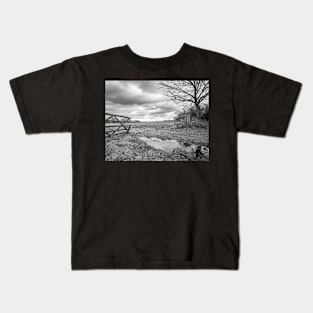 Wooden gate showing the entrance to an arable field in the English countryside Kids T-Shirt